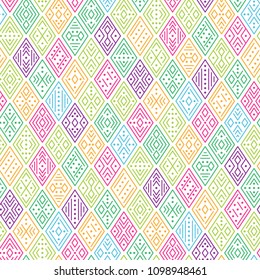 Ethnic boho seamless pattern for textile and design. Multicolor geometric ornament on white background
