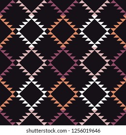 Ethnic boho seamless pattern. The texture of the triangles. Traditional ornament. Tribal pattern. Folk motif. Can be used for wallpaper, textile, invitation card, wrapping, web page background.