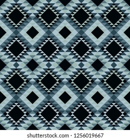 Ethnic boho seamless pattern. The texture of the triangles. Traditional ornament. Tribal pattern. Folk motif. Can be used for wallpaper, textile, invitation card, wrapping, web page background.