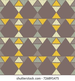 Ethnic boho seamless pattern. Tribal pattern. Retro motif. Textile rapport in yellow and brown hues.