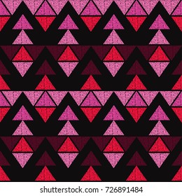 Ethnic boho seamless pattern. Tribal pattern. Retro motif. Textile rapport in red hues.