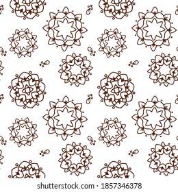Ethnic brown mandala or snowflakes seamless pattern