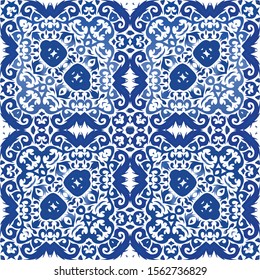 Ethnic ceramic tile in portuguese azulejo. Vector seamless pattern illustration. Colored design. Blue vintage ornament for surface texture, towels, pillows, wallpaper, print, web background.