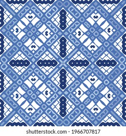 Ethnic ceramic tile in portuguese azulejo. Universal design. Vector seamless pattern texture. Blue vintage ornament for surface texture, towels, pillows, wallpaper, print, web background.