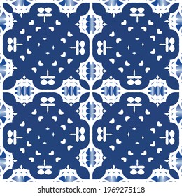 Ethnic ceramic tile in portuguese azulejo. Vector seamless pattern trellis. Universal design. Blue vintage ornament for surface texture, towels, pillows, wallpaper, print, web background.