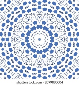 Ethnic ceramic tile in portuguese azulejo. Vector seamless pattern texture. Fashionable design. Blue vintage ornament for surface texture, towels, pillows, wallpaper, print, web background.