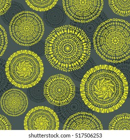 ethnic circular seamless pattern on a dark background