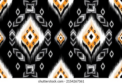 diseño étnico de fondo abstracto. Patrón sin foco en las tribus,
bordado folclórico, diseño artístico de Ikat. Impresión de ornamentos de arte geométrico azteca.
Diseño de alfombras, papel pintado, ropa, envoltura, tela, cubierta
