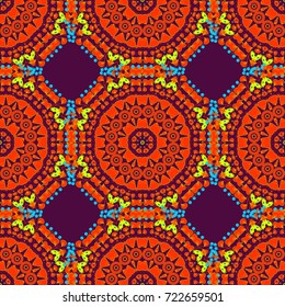 Ethnic design in purple, red and green tones. Round seamless pattern with many details. Vector mandala with flowers and geometric elements. Mandala art, boho chic. Arabic, indian, oriental motif.