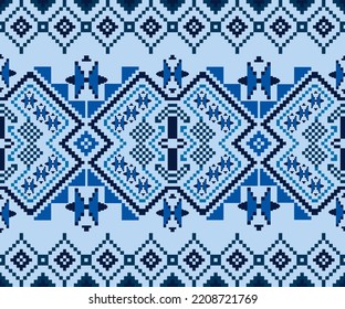 Das ethnische Stoffmuster mit thailändischen Seidenmotiven auf blauem Hintergrund. Traditionelle thailändische Designs von Textilien. Abstraktes geometrisches nahtloses Muster. Die blauen Stoffmotive. Vektorgrafik. 