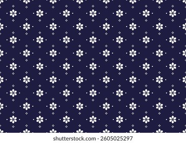 ethnic fabric seamless pattern with white flowers on a dark blue background. design for cloth, carpet, batik, wallpaper, wrapping etc.