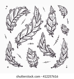 Ethnic feathers. Feather Vector Set. Hand Drawn Doodle Bird feathers. Tribal Feathers.