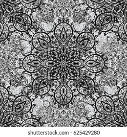 Ethnic, floral, retro, doodle, vector, tribal design element. Gray background. Zentangle style. Floral doodle. Seamless pattern for adult coloring book.