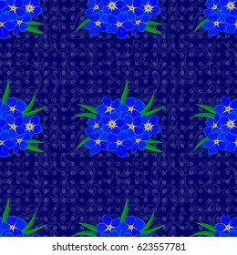 Ethnic floral seamless pattern on a blue background with decorative forget-me-not flowers. Vector illustration.