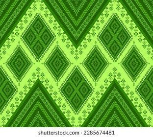 Ethnic folk geometric seamless pattern in green tone in vector illustration design for fabric, mat, carpet, scarf, wrapping paper, tile and more
