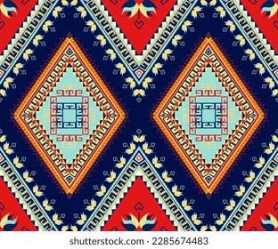 Ethnic folk geometric seamless pattern in red and blue tone in vector illustration design for fabric, mat, carpet, scarf, wrapping paper, tile and more