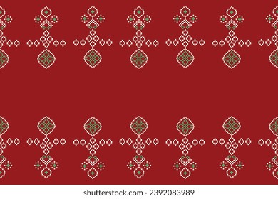 Ethnic geometric fabric pattern Cross Stitch.Ikat embroidery Ethnic oriental Pixel pattern red christmas day background. Abstract,vector,illustration. Texture,frame,decoration,motifs,silk wallpaper.