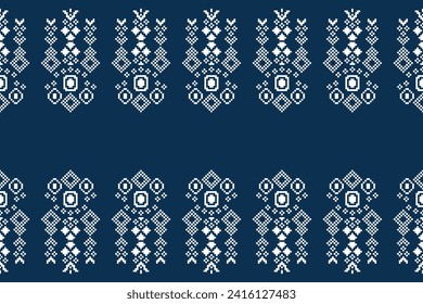 Ethnic geometric fabric pattern Cross Stitch.Ikat embroidery Ethnic oriental Pixel pattern navy blue background. Abstract,vector,illustration. Texture,clothing,scarf,decoration,motifs,silk wallpaper.
