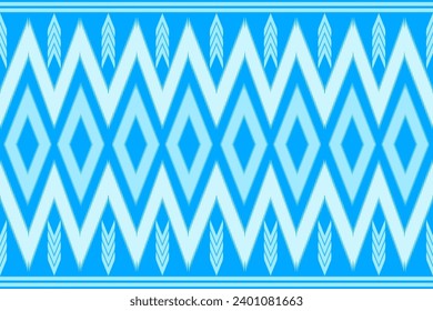 Ethnic geometric pattern design for traditional clothing carpet wallpaper background uses blue tones.