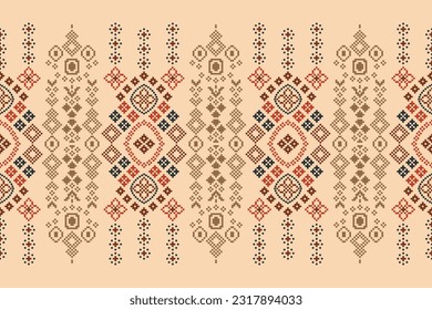 Ethnic geometric seamless fabric pattern Cross Stitch.Ikat embroidery oriental Pixel pattern cream background. Abstract,vector,illustration. Texture,Cross Stitch,frame,decoration,motifs,wallpaper.