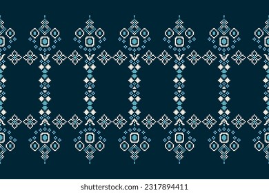 Ethnic geometric seamless fabric pattern Cross Stitch.Ikat embroidery oriental Pixel pattern blue background. Abstract,vector,illustration. Texture,Cross Stitch,frame,decoration,motifs,wallpaper.