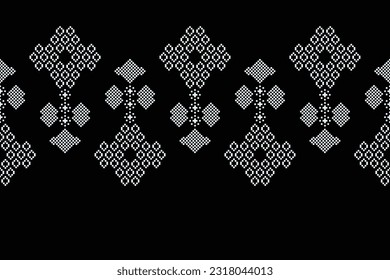 Ethnic geometric seamless fabric pattern Cross Stitch.Ikat embroidery oriental Pixel pattern black background. Abstract,vector,illustration. Texture,Cross Stitch,frame,decoration,motifs,wallpaper.