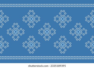 Ethnic geometric seamless fabric pattern Cross Stitch.Ikat embroidery oriental Pixel pattern blue background. Abstract,vector,illustration. Texture,Cross Stitch,frame,decoration,motifs,wallpaper.