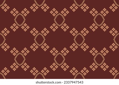 Ethnic geometric seamless fabric pattern Cross Stitch.Ikat embroidery oriental Pixel pattern brown background. Abstract,vector,illustration. Texture,Cross Stitch,frame,decoration,motifs,wallpaper.