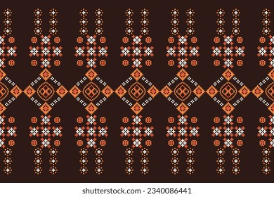 Ethnic geometric seamless fabric pattern Cross Stitch.Ikat embroidery oriental Pixel pattern brown background. Abstract,vector,illustration. Texture,Cross Stitch,frame,decoration,motifs,wallpaper.