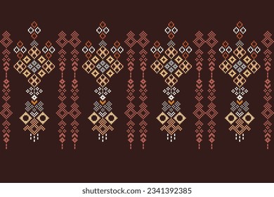 Ethnic geometric seamless fabric pattern Cross Stitch.Ikat embroidery oriental Pixel pattern brown background. Abstract,vector,illustration. Texture,Cross Stitch,frame,decoration,motifs,wallpaper.