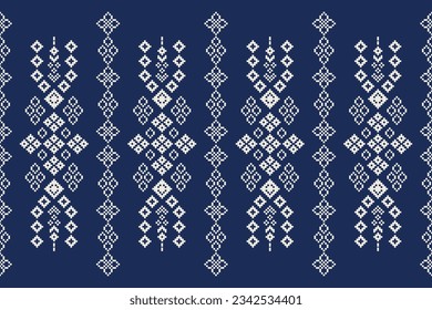 Ethnic geometric seamless fabric pattern Cross Stitch.Ikat embroidery oriental Pixel pattern blue background. Abstract,vector,illustration. Texture,Cross Stitch,frame,decoration,motifs,wallpaper.