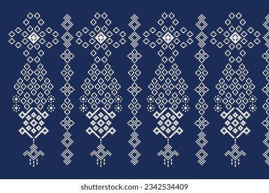 Ethnic geometric seamless fabric pattern Cross Stitch.Ikat embroidery oriental Pixel pattern blue background. Abstract,vector,illustration. Texture,Cross Stitch,frame,decoration,motifs,wallpaper.