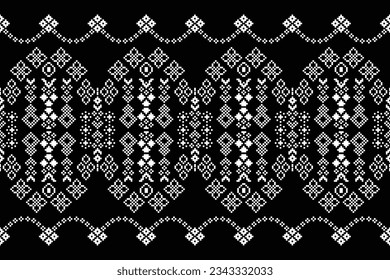 Ethnic geometric seamless fabric pattern Cross Stitch.Ikat embroidery oriental Pixel pattern black background. Abstract,vector,illustration. Texture,Cross Stitch,frame,decoration,motifs,wallpaper.