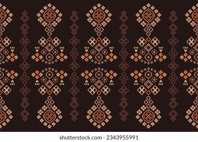 Ethnic geometric seamless fabric pattern Cross Stitch.Ikat embroidery oriental Pixel pattern brown background. Abstract,vector,illustration. Texture,Cross Stitch,frame,decoration,motifs,wallpaper.