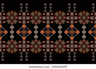 Ethnic geometric seamless fabric pattern Cross Stitch.Ikat embroidery oriental Pixel pattern black background. Abstract,vector,illustration. Texture,Cross Stitch,frame,decoration,motifs,wallpaper.