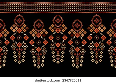 Ethnic geometric seamless fabric pattern Cross Stitch.Ikat embroidery oriental Pixel pattern black background. Abstract,vector,illustration. Texture,Cross Stitch,frame,decoration,motifs,wallpaper.