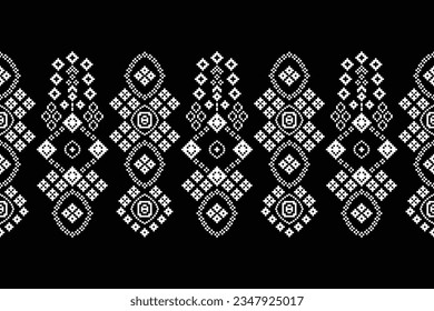 Ethnic geometric seamless fabric pattern Cross Stitch.Ikat embroidery oriental Pixel pattern black background. Abstract,vector,illustration. Texture,Cross Stitch,frame,decoration,motifs,wallpaper.