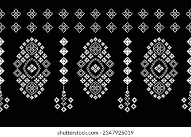 Ethnic geometric seamless fabric pattern Cross Stitch.Ikat embroidery oriental Pixel pattern black background. Abstract,vector,illustration. Texture,Cross Stitch,frame,decoration,motifs,wallpaper.