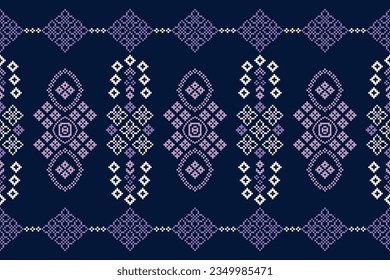 Ethnic geometric seamless fabric pattern Cross Stitch.Ikat embroidery oriental Pixel pattern blue background. Abstract,vector,illustration. Texture,Cross Stitch,frame,decoration,motifs,wallpaper.