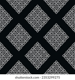 Ethnic geometric seamless fabric pattern Cross Stitch.Ikat embroidery oriental Pixel pattern black background. Abstract,vector,illustration. Texture,Cross Stitch,frame,decor,motifs,wallpaper.