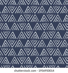 Ethnic geometric seamless pattern, African tribal endless ornament background. Hand drawn vector illustration, textile print, wallpapers design. Blue and white color