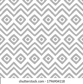 Ethnic geometrical seamless pattern. Endless tribal ornamental background. Zigzag, square, rhombus shapes. Vector illustration for fabric, textile, wallpaper, carpet, embroidery, print