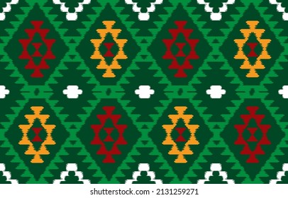 Ethnic green background. Seamless in tribal, folk embroidery, native ikat fabric. Aztec geometric art ornament print. Design for carpet, wallpaper, clothing, wrapping, textile, tissue, decorative