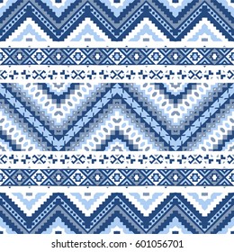 Ethnic hand drawn seamless pattern. Aztec print in blue colors on white background