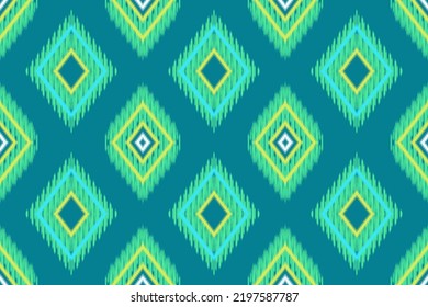 fondo étnico del patrón de quevron del ikat El patrón tradicional se une o se amarra. Esto se refiere al método de tintado utilizado para dar a los textiles su singular vitalidad de diseño y color.