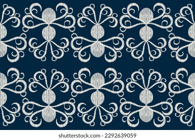 Ethnic Ikat fabric pattern geometric style.African Ikat embroidery Ethnic oriental pattern navy blue background. Abstract,vector,illustration.For texture,clothing,scarf,decoration,carpet.