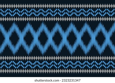Ethnic Ikat fabric pattern geometric style.African Ikat embroidery Ethnic oriental pattern blue background. Abstract,vector,illustration.Texture,frame,scarf,decoration,carpet,wallpaper,silk motif.