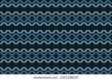 Ethnic Ikat fabric pattern geometric style.African Ikat embroidery Ethnic oriental pattern blue background. Abstract,vector,illustration.Texture,frame,scarf,decoration,carpet,wallpaper,silk motif.