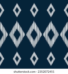 Ethnic Ikat fabric pattern geometric style.African Ikat embroidery Ethnic oriental pattern blue background. Abstract,vector,illustration.Texture,frame,scarf,decoration,wallpaper,silk,motif.