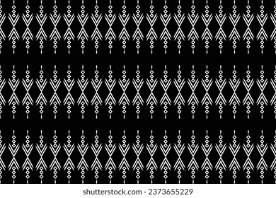 Ethnische Ikat-Stoffmuster geometrischen Stil.afrikanische Ikat Stickerei Ethnische orientalische Muster schwarzen Hintergrund. Abstrakt,Vektorgrafik,Textur,Rahmen,Schal,Dekoration,Teppich,Tapeten,Seidenmotive.